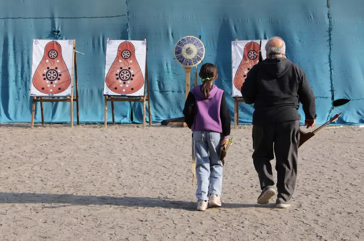 Baba-kız okçuluk kursunda!